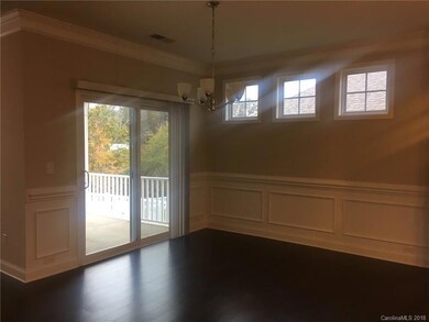 Dining Area opens up to Covered Back Patio