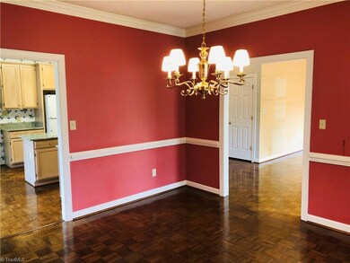 Dining room looking in to Kitchen to left and family room to right.