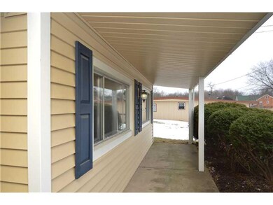 Exterior Front. Cover cement front patio