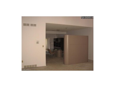 VIEW FROM FOYER TO DINING RM AND FAMILY RM