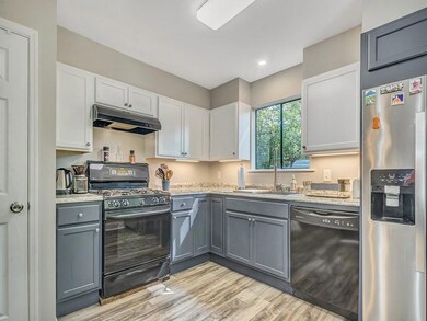 The kitchen has stainless appliances and plenty of