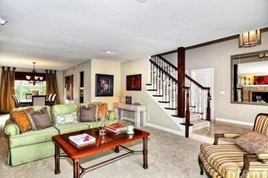 Living Room with view of beautiful two toned stair
