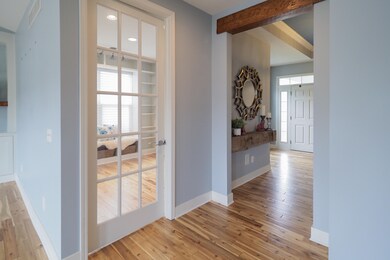 Foyer and view of office