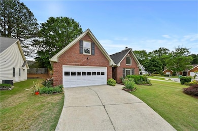 Traditional-style house with brick siding, concret