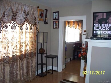 LIVING ROOM HAS A LOT OF NATURAL LIGHT