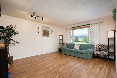 Living room featuring views of the Bridger Mountai