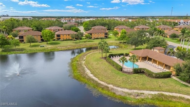 Aerial view of residential area with a large body