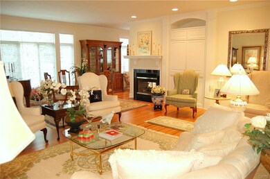 Custom cabinetry and a two-side fireplace