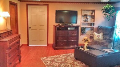 Warm living room, open to the dining and kitchen a