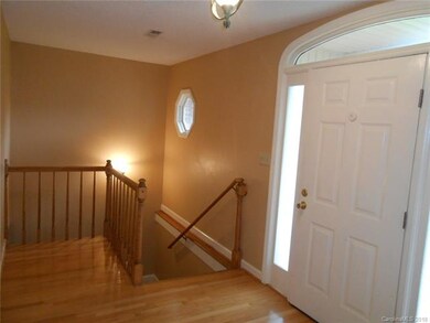 Foyer and stairway to the basement.