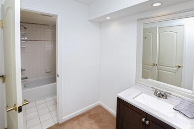 The master bathroom with an updated vani