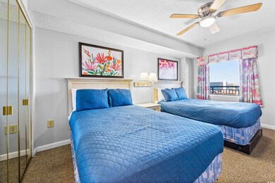 Carpeted bedroom with a textured ceiling, ceiling 