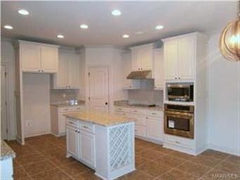 GORGEOUS KITCHEN HAS A WORK ISLAND, GRANITE COUNTE
