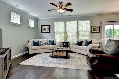 You will love the light filled great room that overlooks the private fenced backyard.