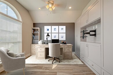 Spacious and inviting home office with ample natur