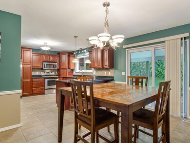 What a wonderful eat-in kitchen including sliding 