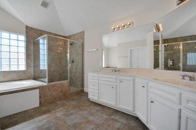 Separate tub and shower and double sinks in the pr