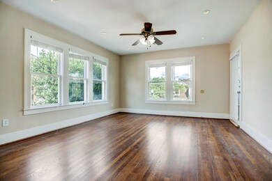 View of the living room from the dining room.  The