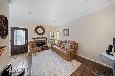 Open-concept layout flows from living to dining, w