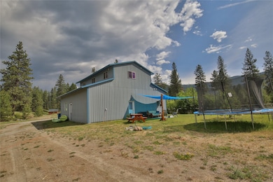 View of outdoor structure with a trampoline