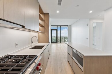 Kitchen featuring a wall of windows, modern cabin