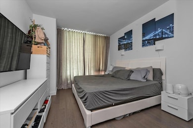 Bedroom featuring wood finished floors