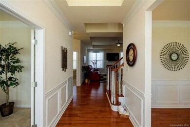 Beautiful hardwoods adorn the entryway, formal are