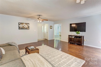 Front door leads into living room. Coat closets inside foyer.