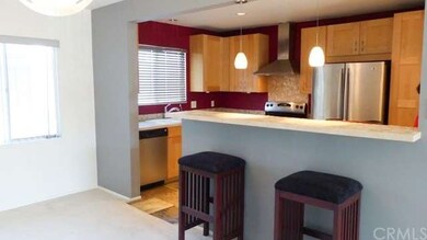 Kitchen opens to the dining area.  