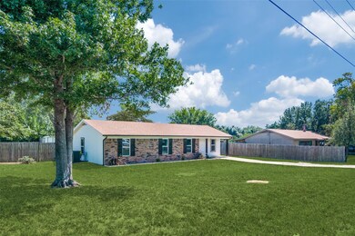 View of front of home featuring a front lawn
