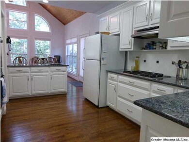 Kitchen with granite countertops.