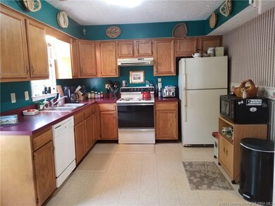 Dishwasher, Refrigerator, Range/Oven to remain
