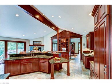 Here is the vaulted beam-ceiling Gourmet Kitchen -
