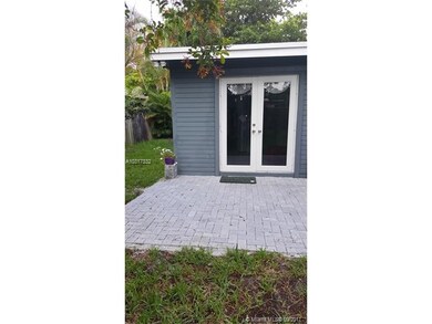 paver rear patio, doors are impact and security mo