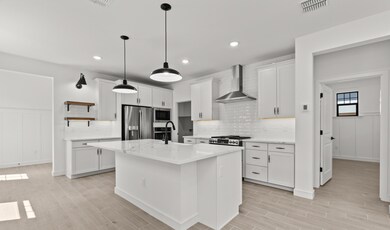 Kitchen with stylish floating shelves
