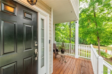 Property entrance with covered porch