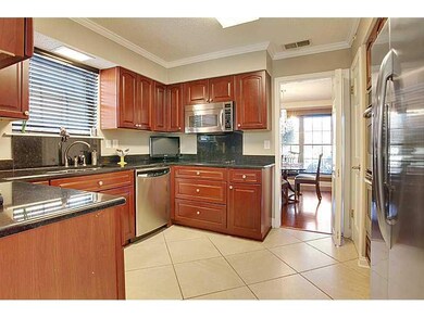 Kitchen. Kitchen opens to dining room. Double stai