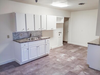 Kitchen with new vinyl plank flooring