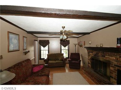 Exterior Front - Large family room with a brick, w