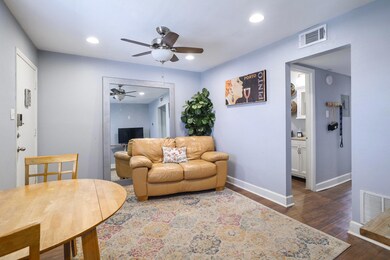 Living area featuring dark wood finished floors, 