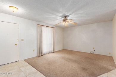 10821 W Kelso-6 Living Rm 1