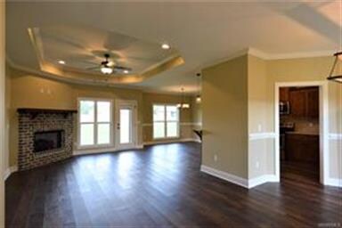 GREAT ROOM IS BEAUTIFUL WITH THE OVAL TREY CEILING