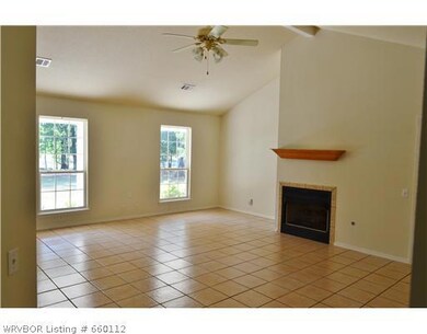 Living Room. 19 X 21 FT LIVING RM WITH GAS LOG FIREPLACE, CATHEDRAL CEILING & LOTS OF LIGHT. VERY PEACEFUL.