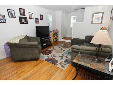 Living Room. Hardwood floors greet you into the Li