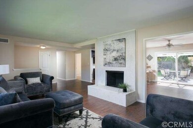 Light & bright, open living room from the opposite