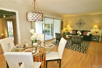 Living and dining room with slider entry/exit to c