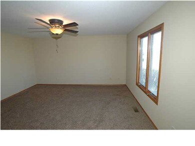 Master bedroom with new paint, carpet, light fixtu