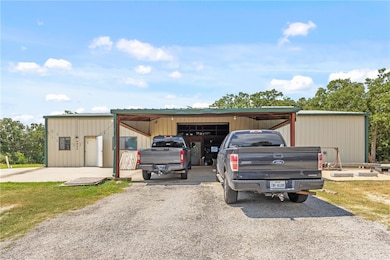 Garage featuring driveway