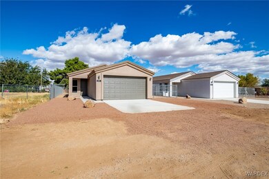 Ranch-style home with a garage