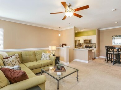 An upgraded ceiling fan and light keep the living 